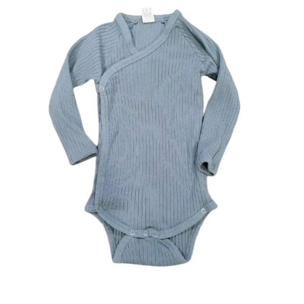 Kate Quinn long sleeve ribbed bodysuit